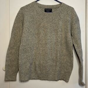 Banana republic grey sweater w gold shimmery specs throughout. Italian yarn